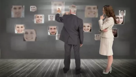 Businessman picking millennials