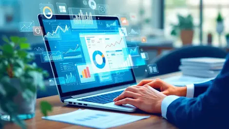 Business professional using laptop with digital charts spreadsheet forecasting office